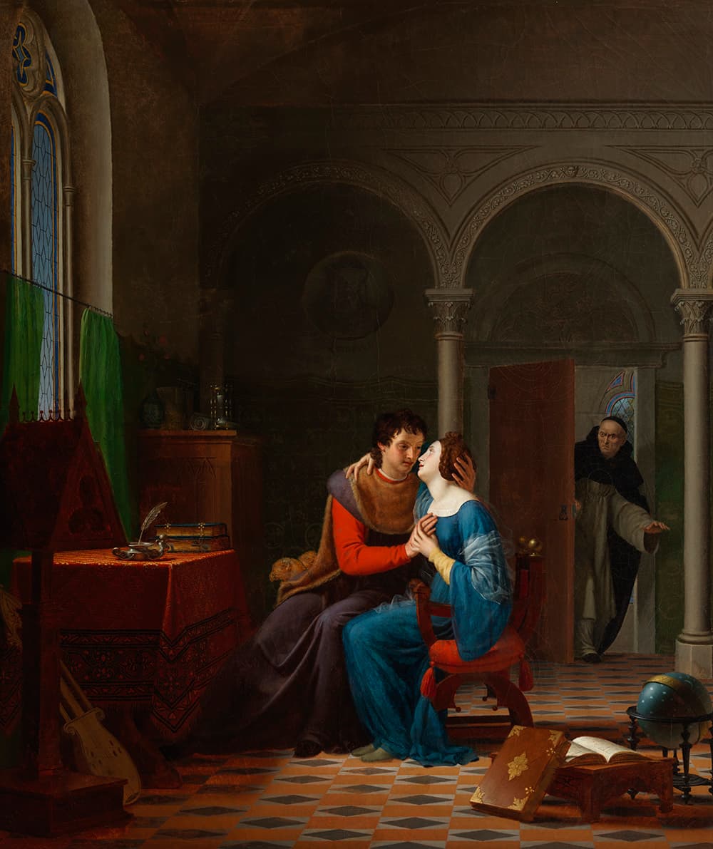 A man and woman in medieval clothing sit closely, sharing an intimate moment in a richly decorated room, as an older man in black robes looks on from the doorway in surprise. Books and musical instruments surround them.