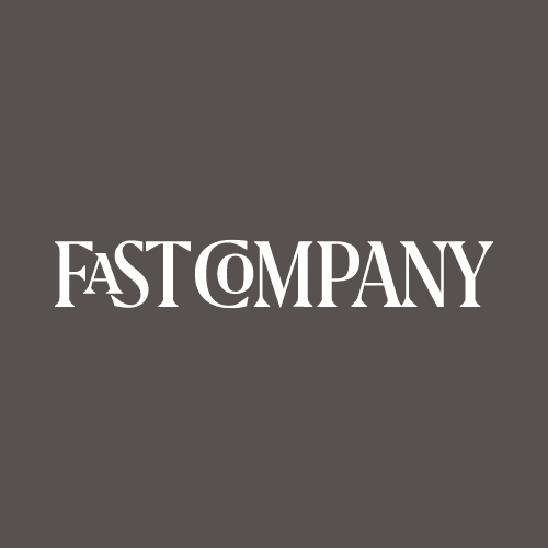 The image shows the "Fast Company" logo in white text with a stylized "O," set against a dark gray background.