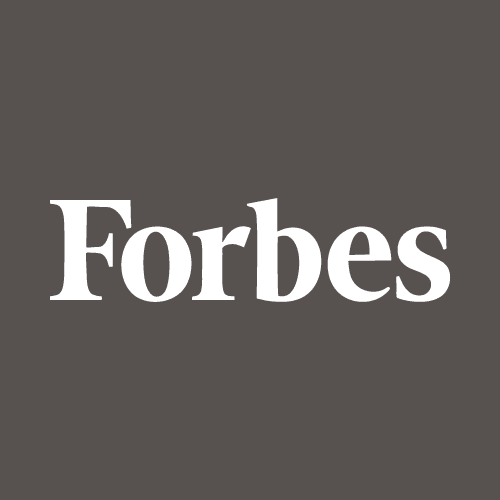 The image shows the Forbes logo with the word "Forbes" in white serif font centered on a dark gray background.