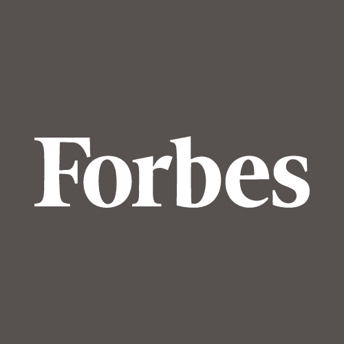 The image shows the Forbes logo with the word "Forbes" in white serif font centered on a dark gray background.