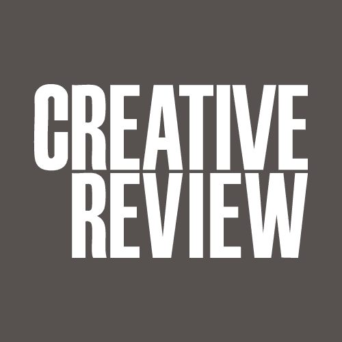 White text on a dark gray background reads "CREATIVE REVIEW" in bold, sans-serif font, with the words stacked vertically.
