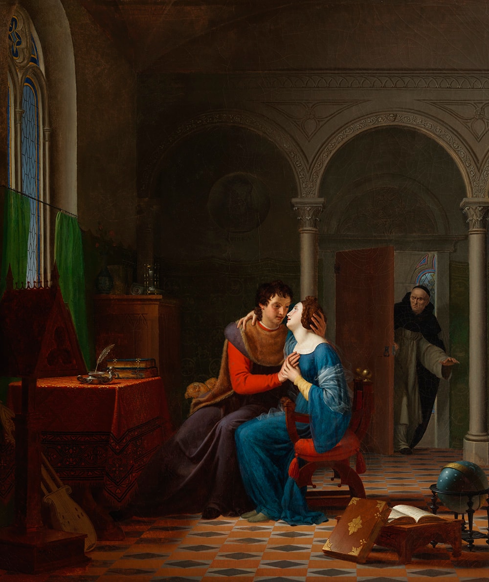 A man and woman in medieval clothing sit closely, sharing an intimate moment in a richly decorated room, as an older man in black robes looks on from the doorway in surprise. Books and musical instruments surround them.