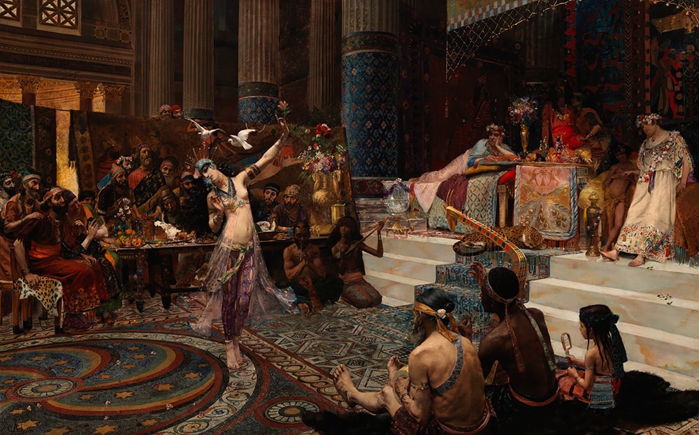 A dancer performs for an opulent ancient court; musicians play, people watch, and a king reclines on a throne surrounded by attendants, all amid lavish, detailed décor and patterns.